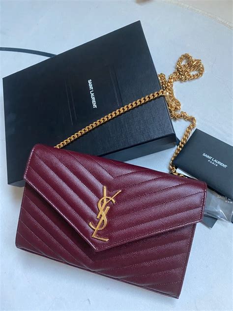 ysl black wallet chain bag|YSL cassandre envelope chain wallet.